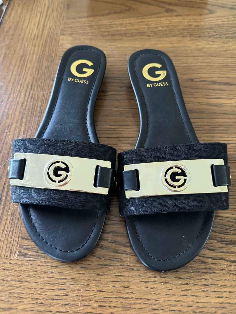 G by Guess Black Slide Sandals with Gold Hardware